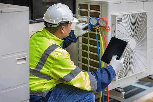 Professional Ac Installation technician working in Sand Lake, NY